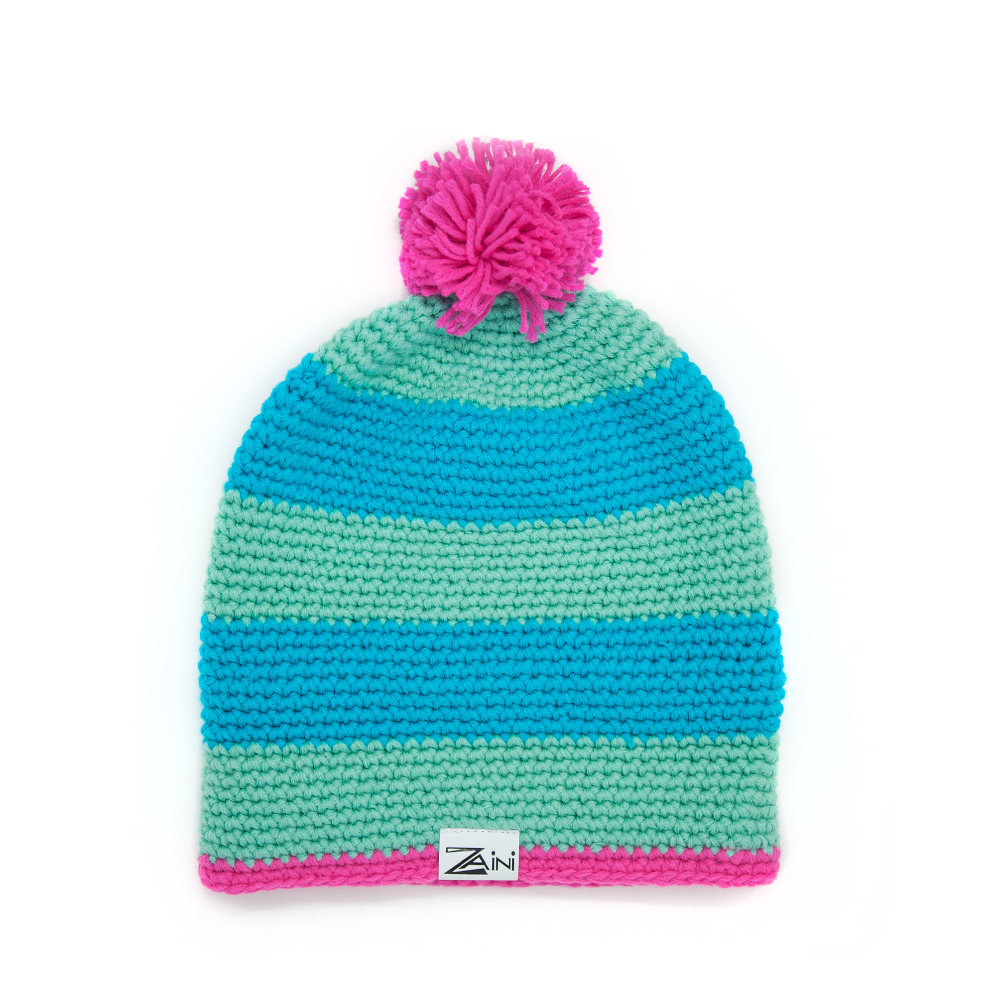 A striped bobble hat with turquoise, blue, and pink colors, featuring a pink pom-pom on top.