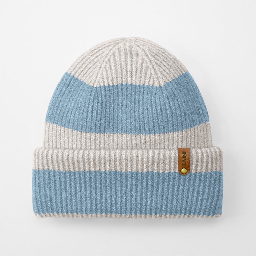 Knitted beanie with two-tone design on a white background