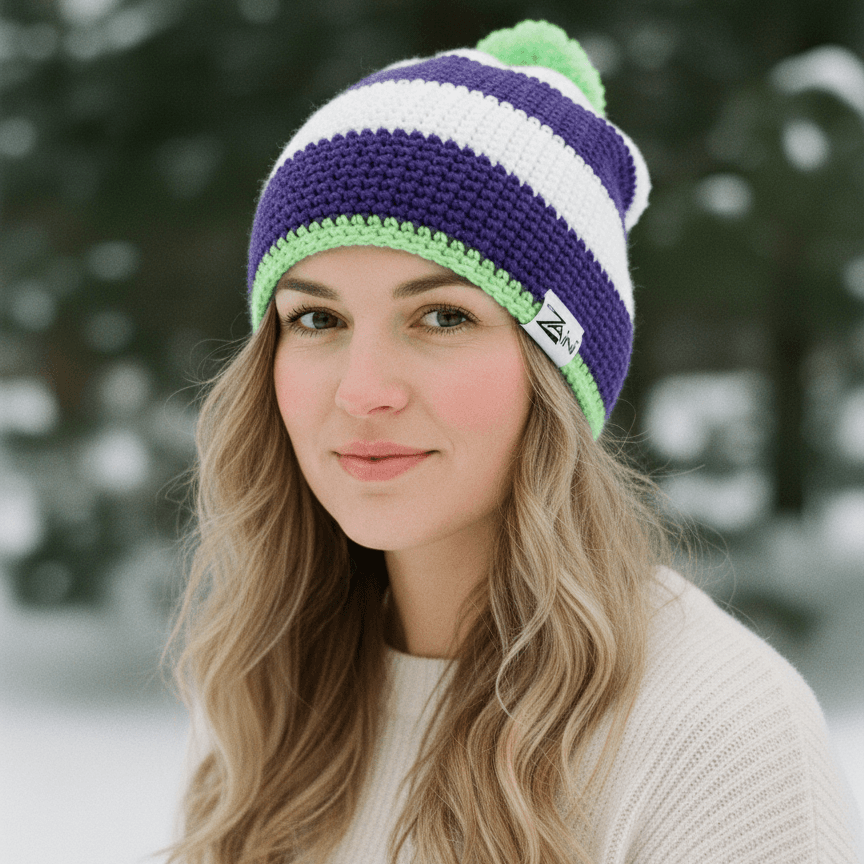 Woman wearing a colorful knit beanie in a snowy forest setting