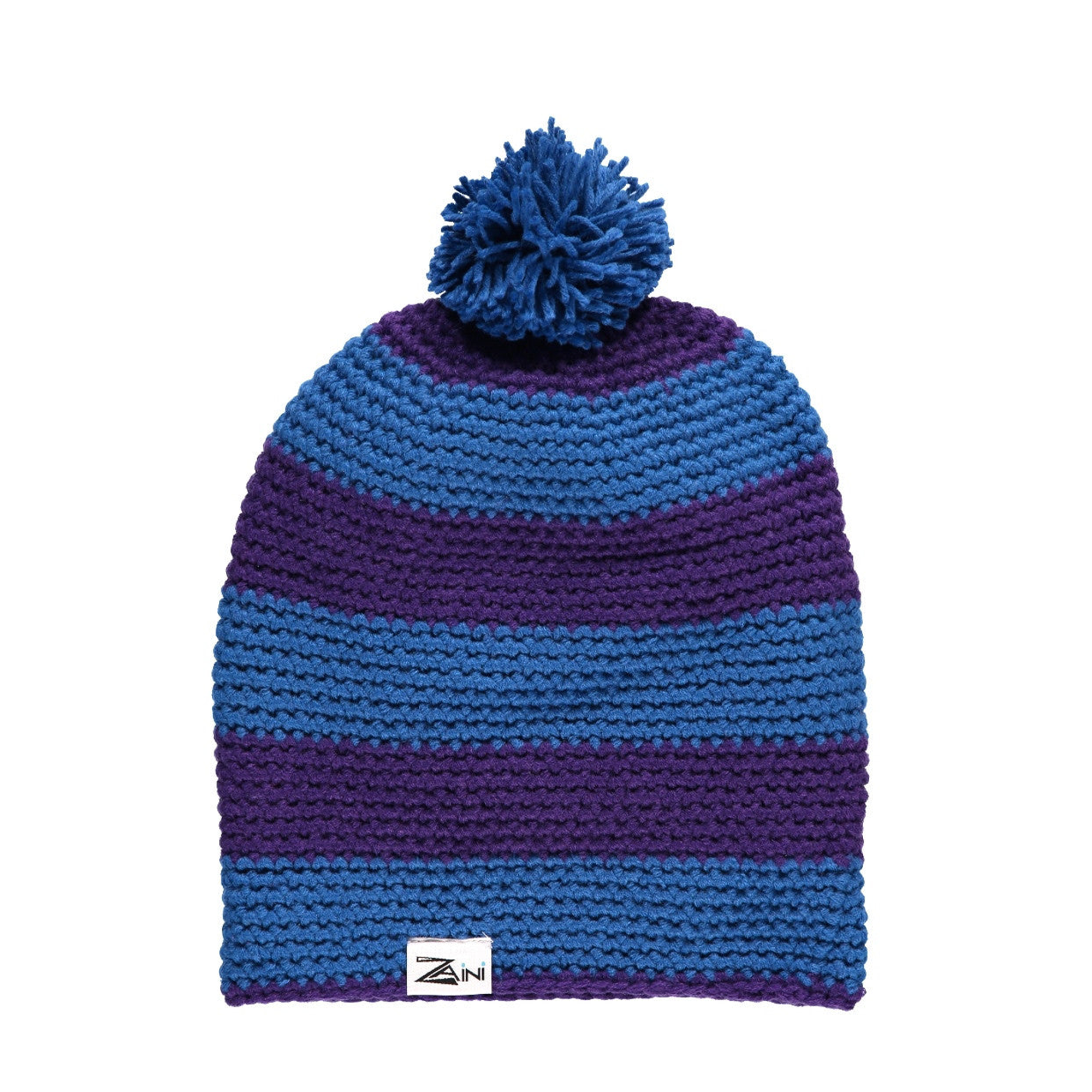 A striped bobble hat with blue and purple colors, handmade from soft acrylic, with a pom-pom on the top.