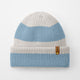 Knitted beanie with two-tone design on a white background