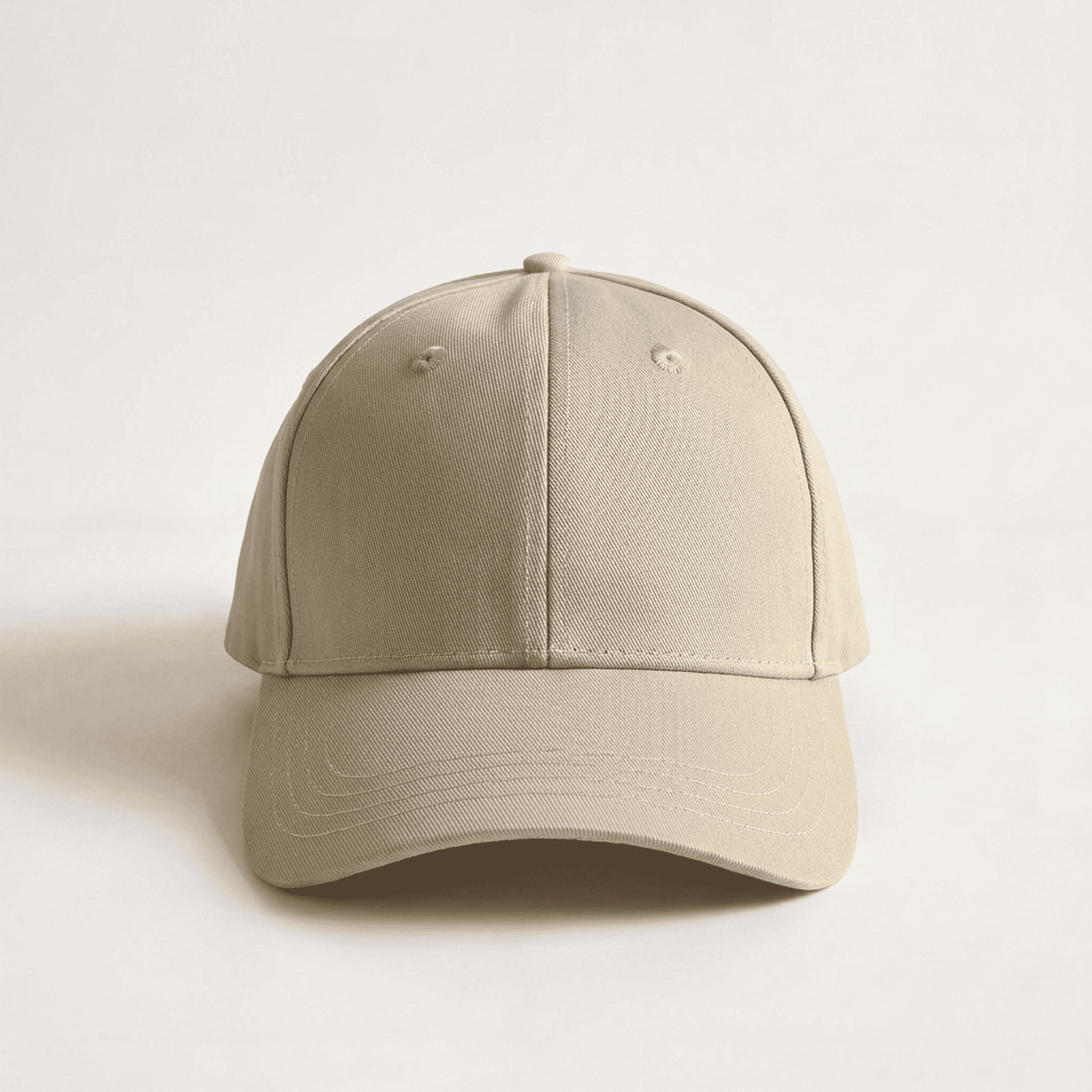 Beige baseball cap on a light gray background