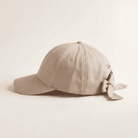 Beige baseball cap with bandana on a light beige background
