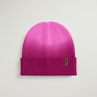Purple beanie hat on a light gray background